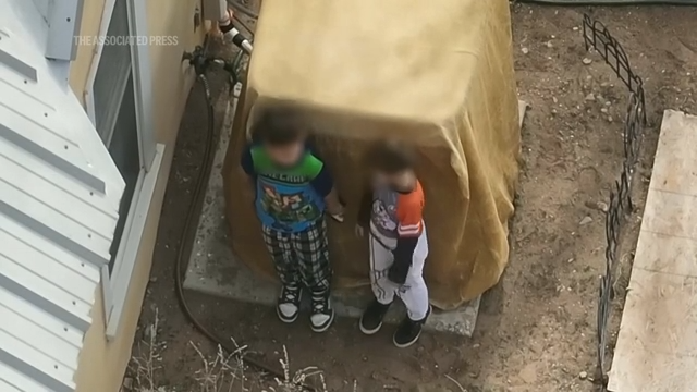 Drone footage shows New Mexico deputies disarm children handling a loaded gun